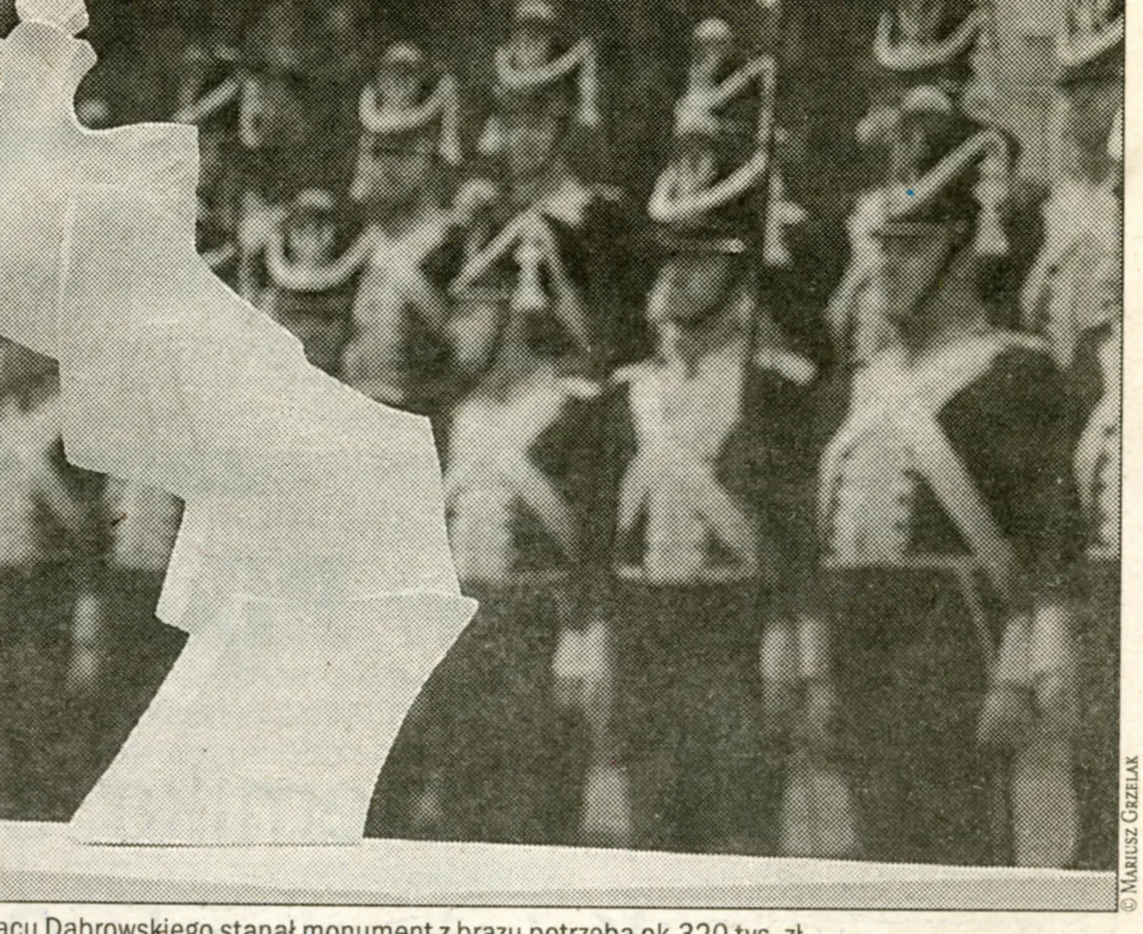 «Pomnik Hymnu Narodowego» (1999), bronzo (progetto); basamento in granito — opera di Antonina Wysocka-Jonczak